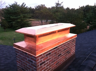 Before and after chimney cap replacement in Plainview, NY